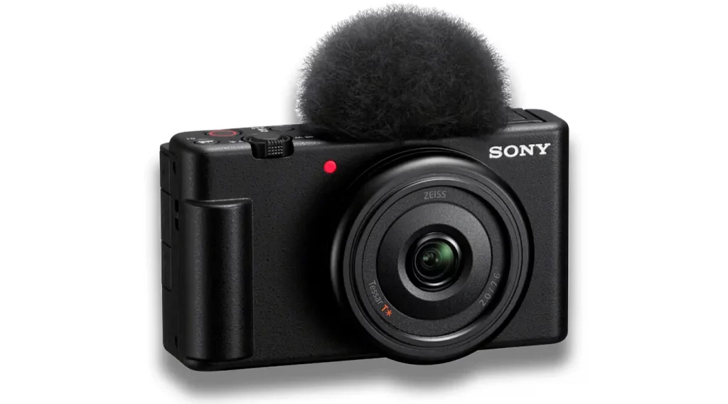Cámara Sony ZV-1F equipada con un micrófono omnidireccional de tres cápsulas y un paravientos.
