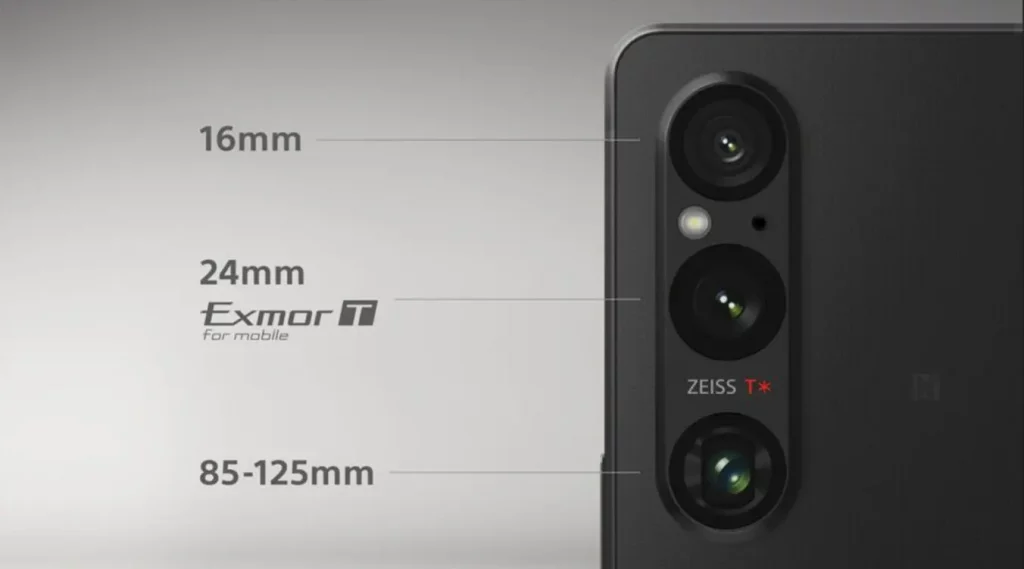 El objetivo de 24 mm en la parte trasera del Xperia 1 V está equipado con el sensor de imagen CMOS apilado con doble capa de transistores de píxeles «Exmor T para móviles», que es cerca de 1,7 veces más grande que los anteriores sensores de imagen. Además, el objetivo zoom óptico 85-125 mm (F2.3-F2.8) permite realizar espectaculares retratos con la mínima distorsión.